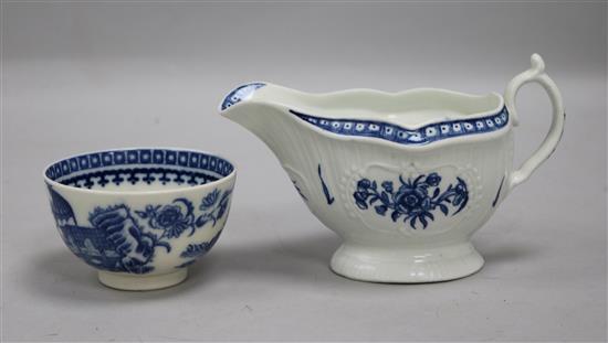 A Worcester blue and white sauceboat and a similar fisherman and cormorant teabowl, c.1770-90
